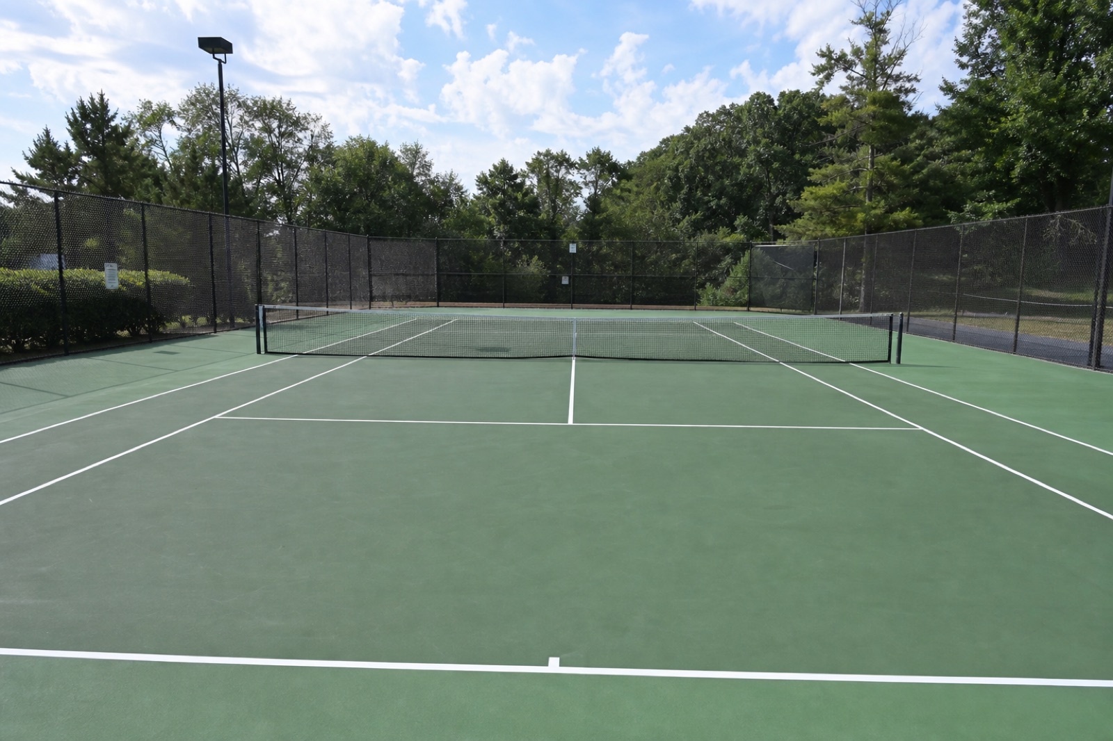 Existing tennis court before pickleball conversion
