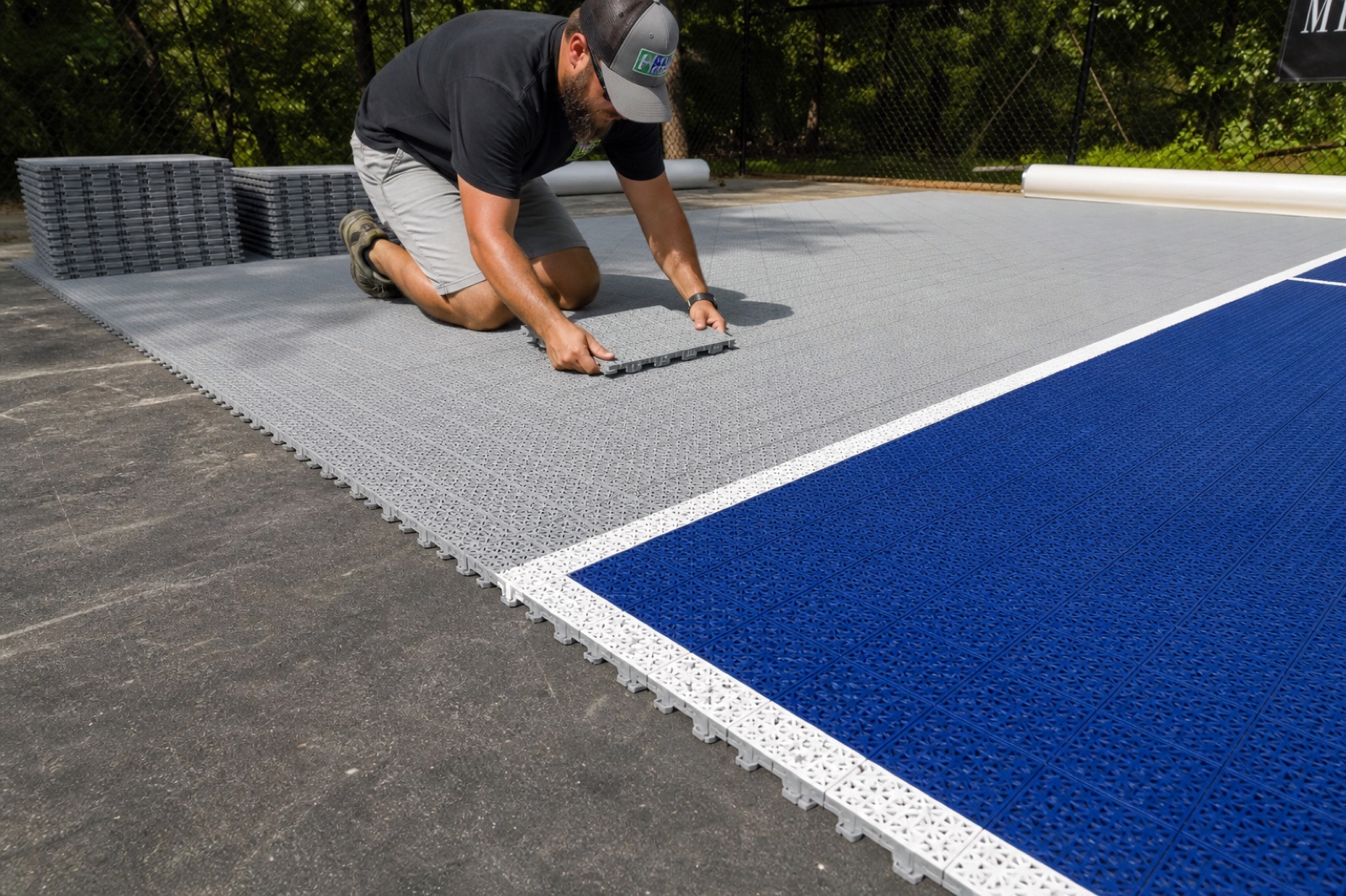 Close view of a modular pickleball court tile system