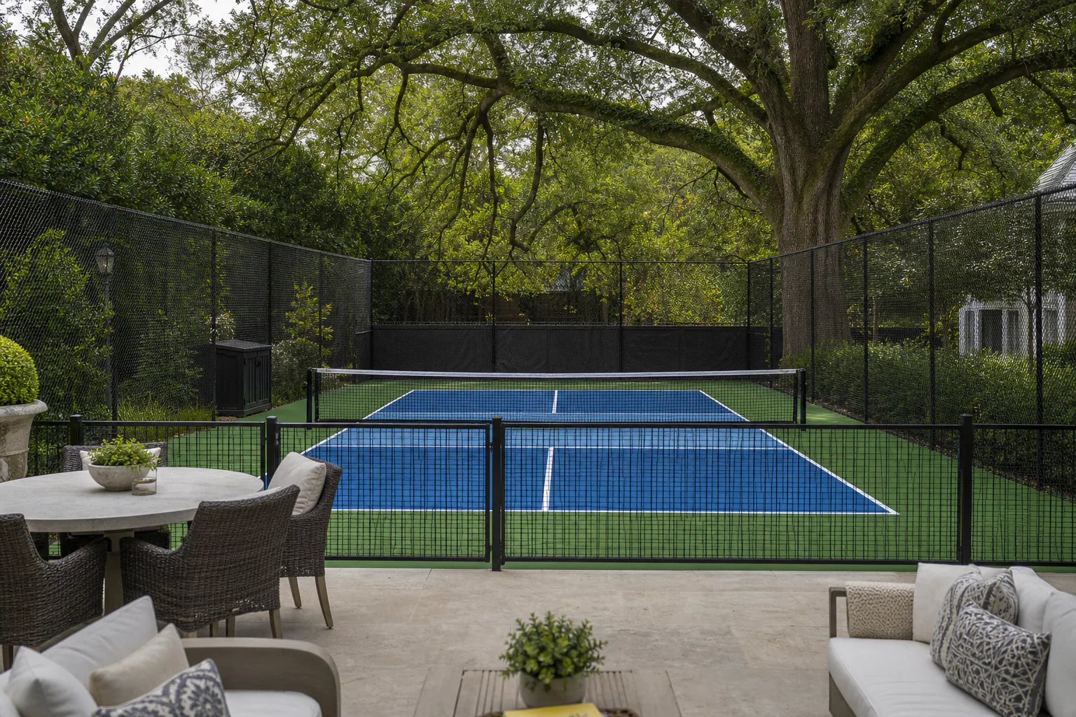 View of the completed Anchorage pickleball court from the estate patio