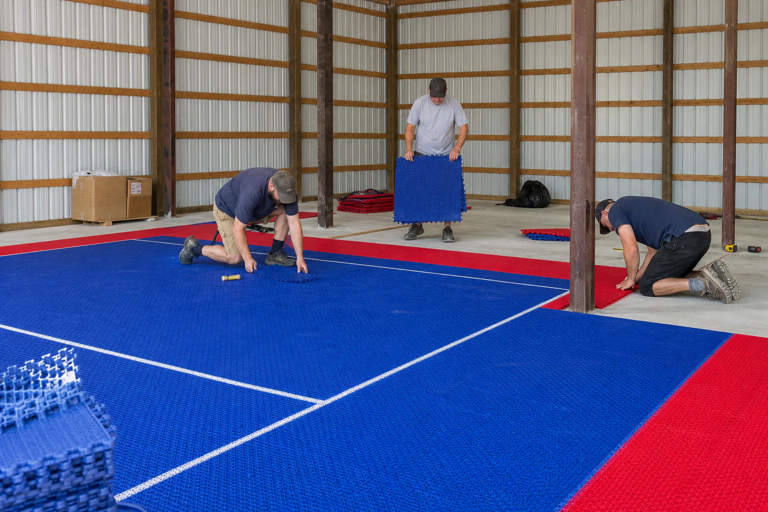 Modular tile installation inside the Georgetown pole barn